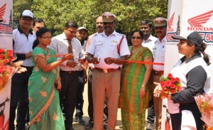 a Ribbon cutting ceremony with Honda officials and RTO authorities at Honda CRF 50 FEST