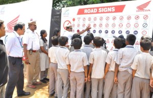 a rippon Honda Officials and RTO officials educating kids on road safety rules at Honda CRF50Fest